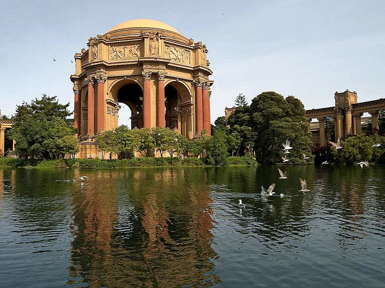 The Palace of Fine Arts rotunda reflected in its lagoon in San Francisco