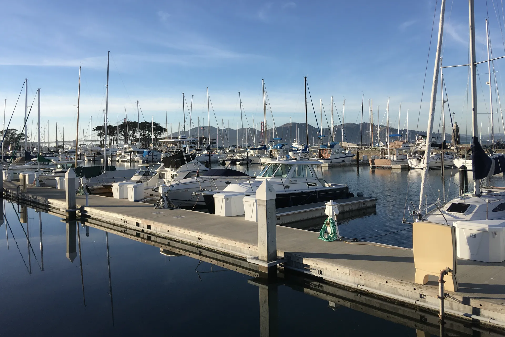 Yachts at Marina Yacht Harbor in San Francisco with the Bay in the background
